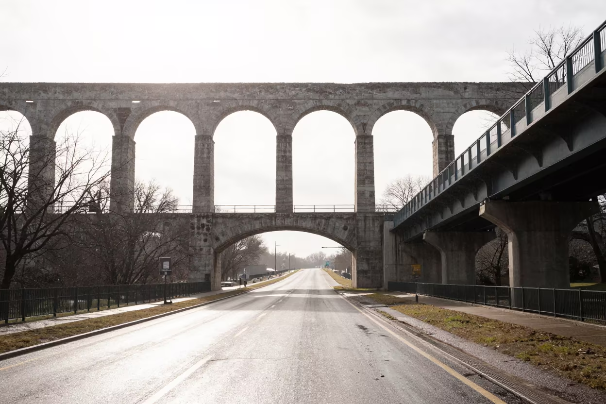 Roman Aqueduct on Missouri Overpass in Winter Sun Shower in across a windy overpass interchange in Missouri