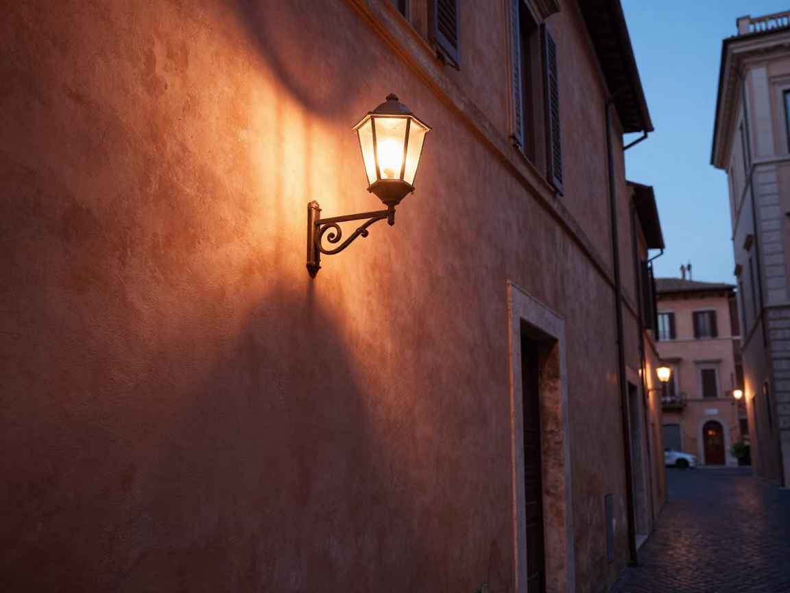 Rome Italy Street Scene Copper Dusk Light with Wall Sconce and Teapot in in Rome, Italy