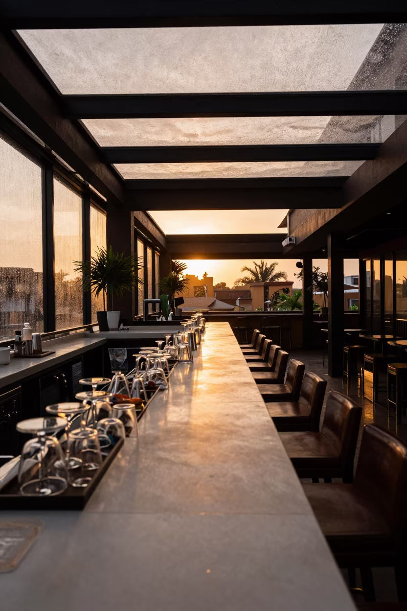 Rooftop Bar Setup in Kano Monsoon Light in in a quiet guest corridor in Kano