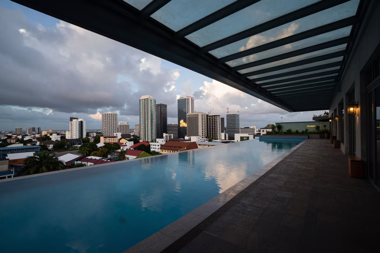 Rooftop Pool Skyline Abidjan Morning Shadow in inside a glass-roofed arcade near Abidjan