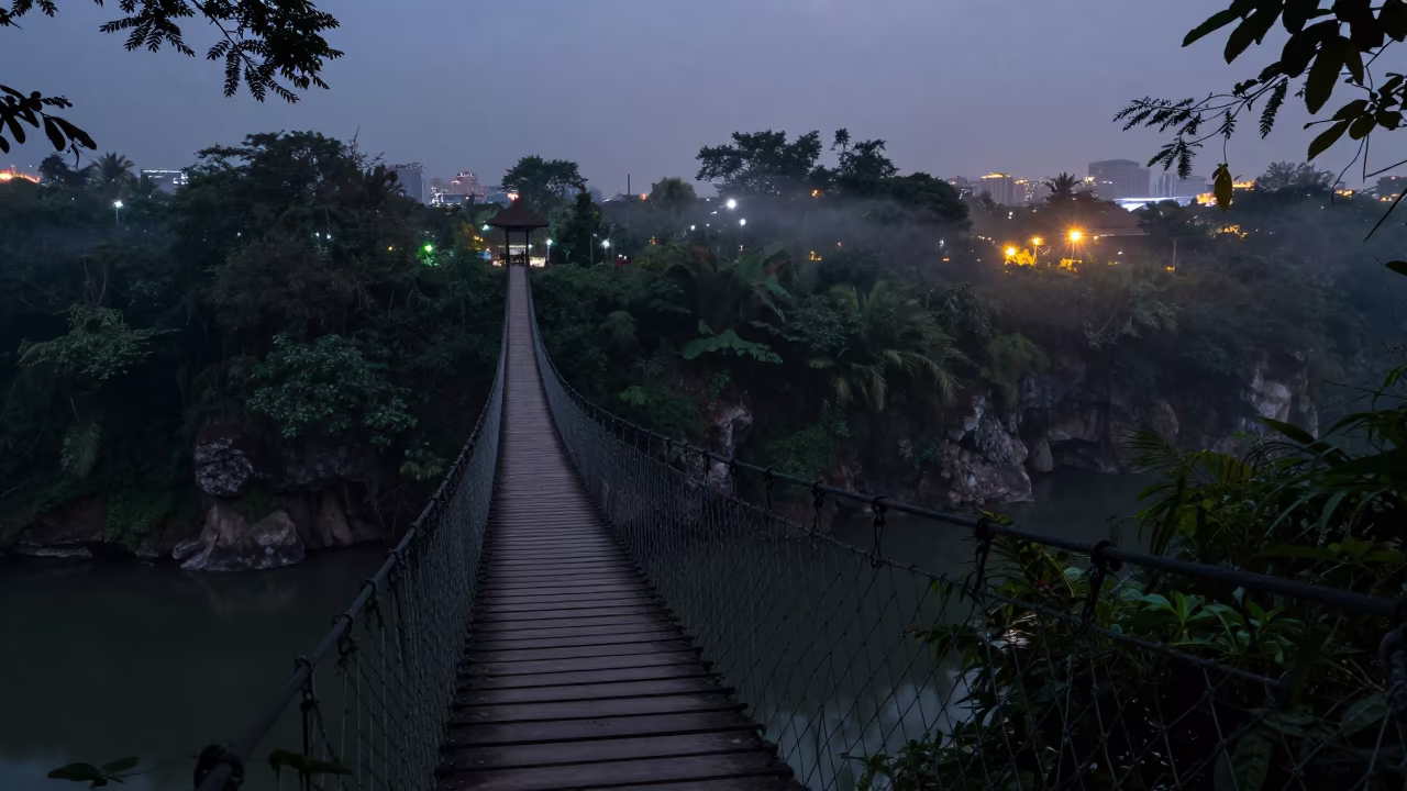 Rope Bridge Over Jungle Gorge at Dusk in near Ho Chi Minh City