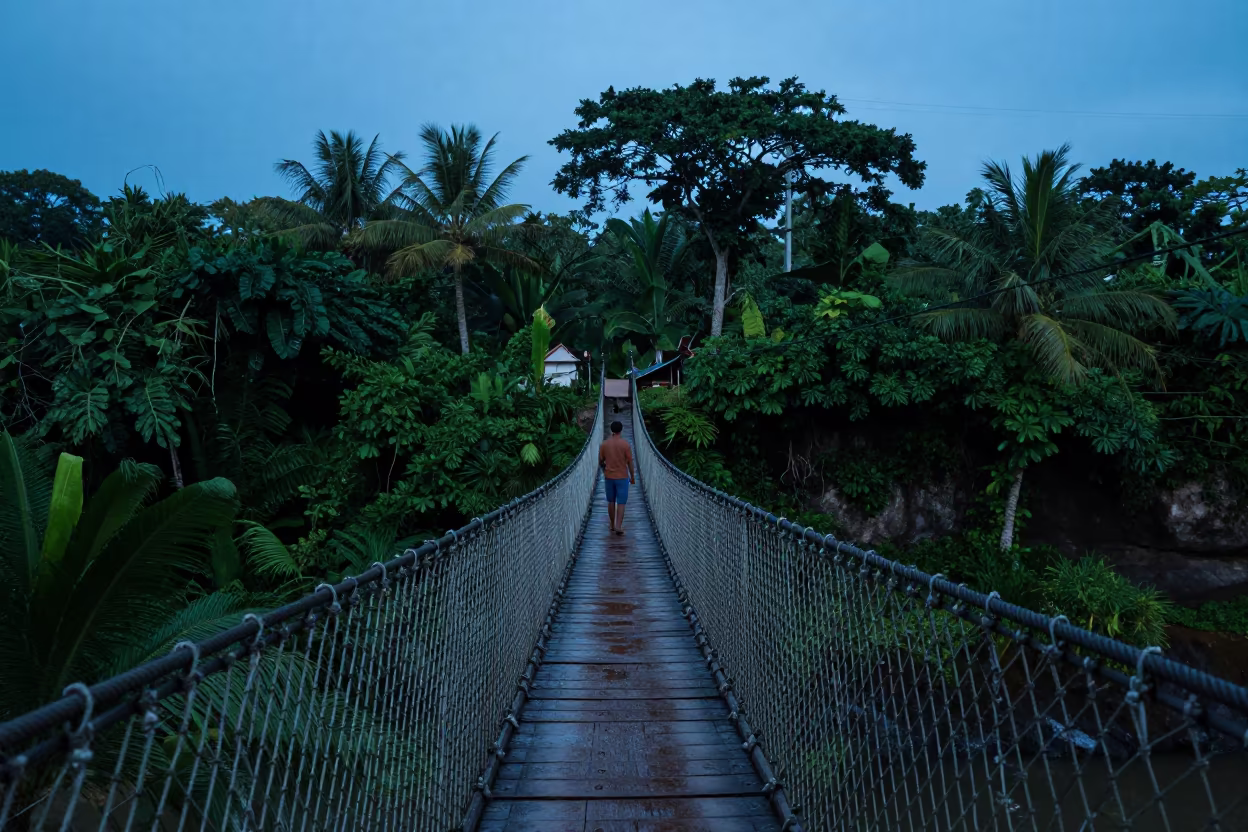 Rope Bridge Over Jungle Gorge at Dawn in near Denpasar