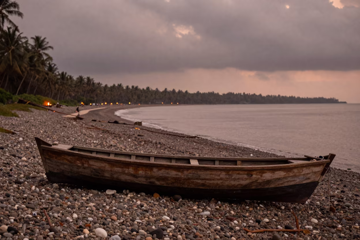 Rowboat on Pebble Beach in Monsoon Light in along a switchback approach in Goa