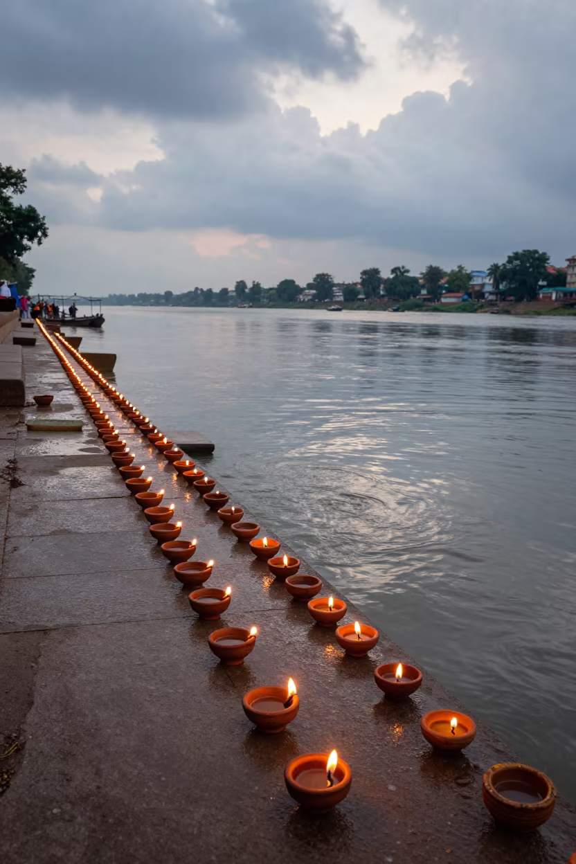 Rows of Oil Lamps on Indian Ghats Morning in at the edge of a sacred pool in India
