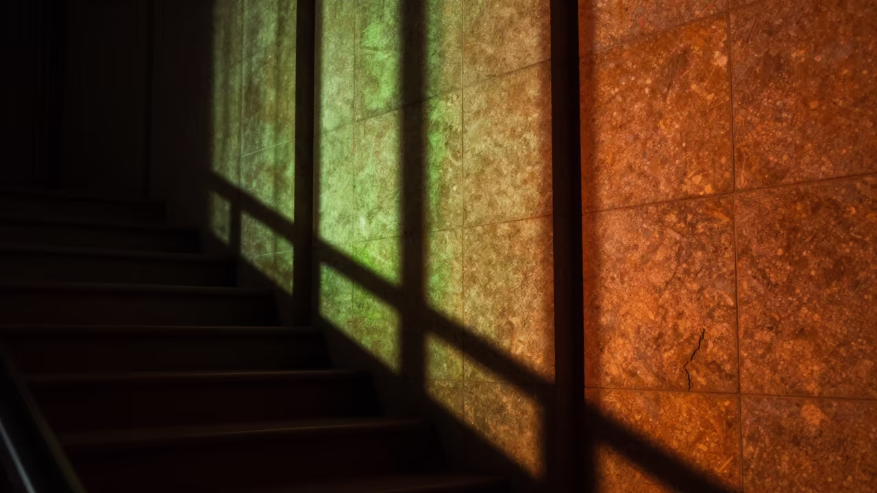 Rust and Moss Green Light on Stone Stair Hall in inside a tiled stair hall in Warnes