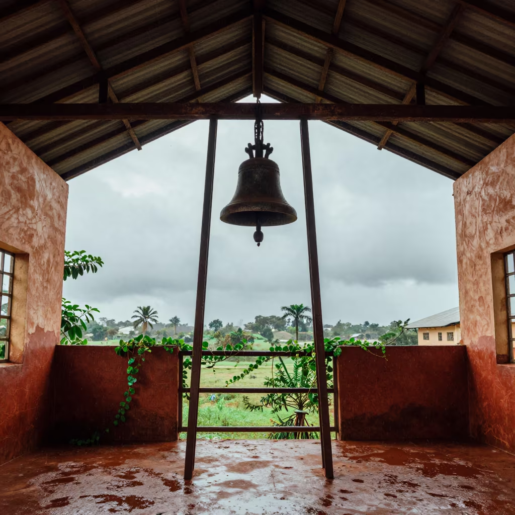 Rusted Bell in Congo Schoolhouse Ruins in inside a roofless nave in Congo