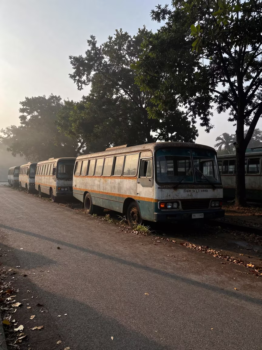 Rusted Double-Decker Bus in Dawn Mist in near Phrae