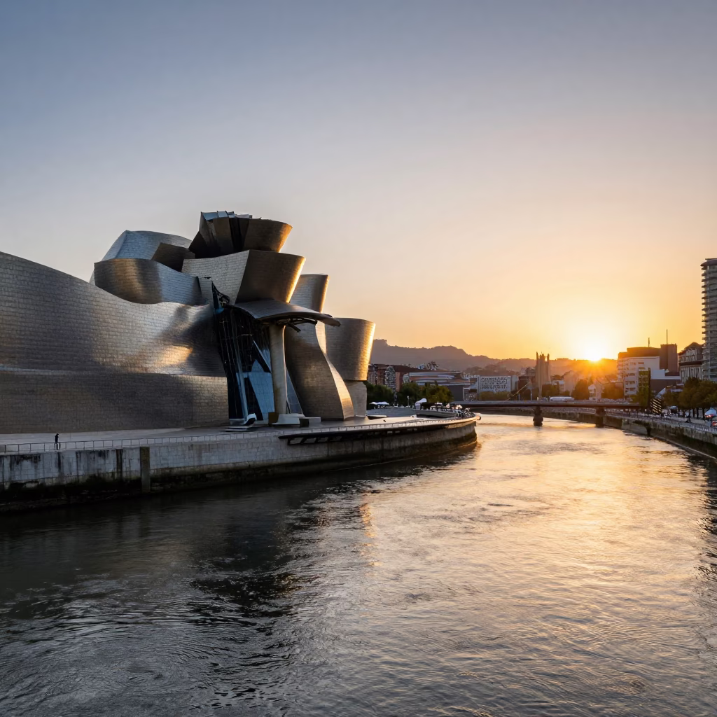 's Guggenheim Museum And Nervion River in Bilbao at Sunset Light in in Bilbao, Spain