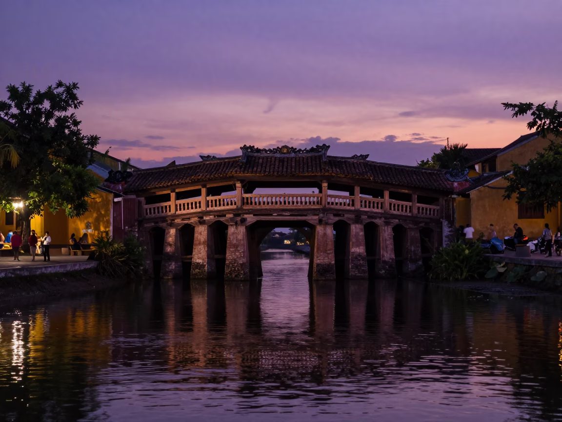’s Japanese Covered Bridge Reflected in Hoi An in in Hoi An, Vietnam