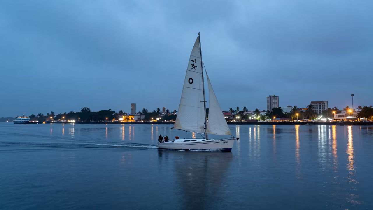 Sailboat Wing on Wing Ferry Crossing Luanda in across a remote ferry crossing near Luanda