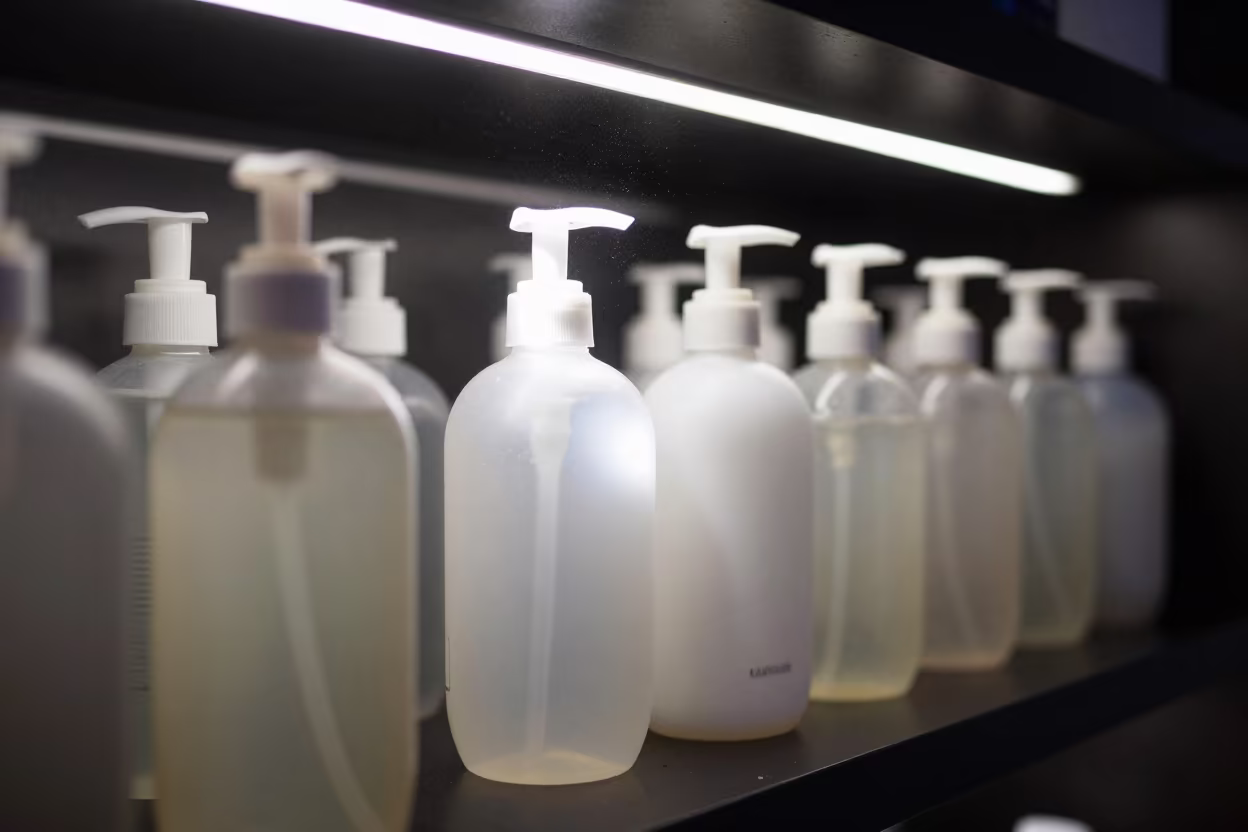 Salon Backbar Pump Shelf Night Glow in at a salon reception counter in Purnia