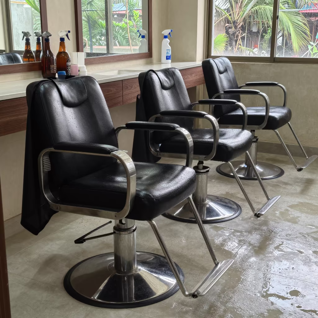 Salon Chair With Clips Cape And Bottles In Bogura in inside a salon row in Bogura