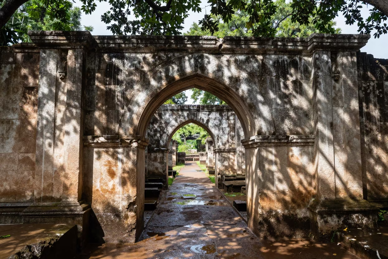 Salt Blooms Rain Streaks Ruin Wall South Sudan in beneath a broken stone arch in South Sudan
