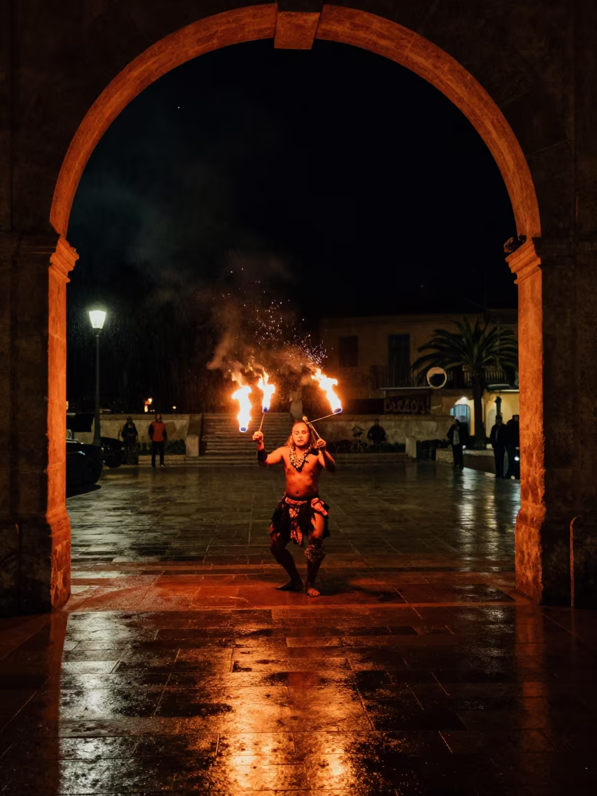 Samoan Fire Knife Dance Night Festival Palma in at a public square during a festival near Palma de Mallorca