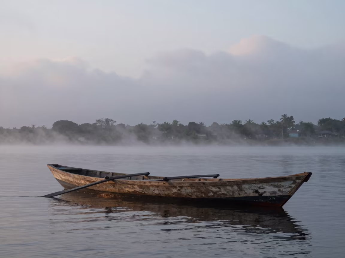 Sampan Boat on Misty River at Dawn in in Dominican Republic
