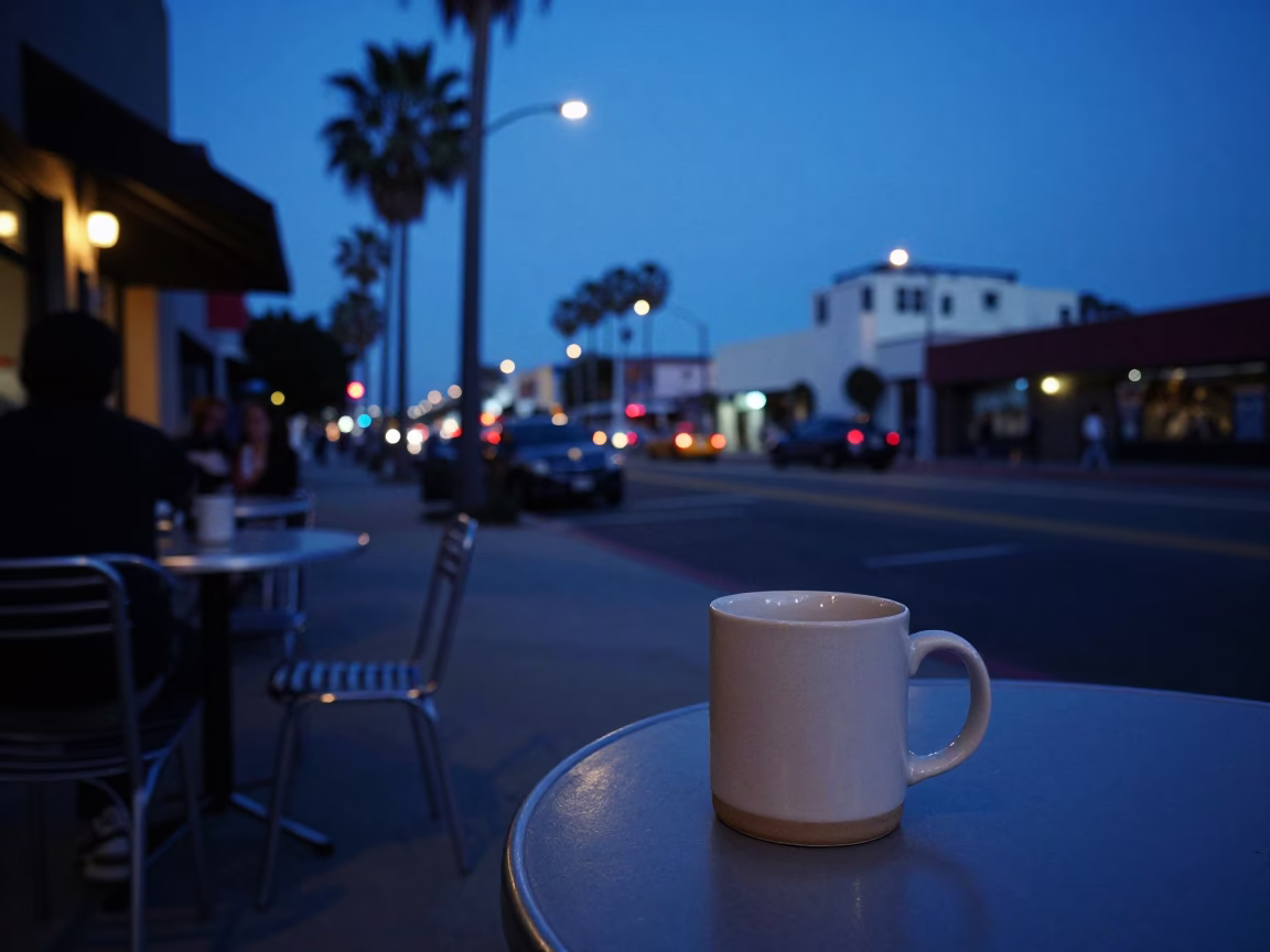San Diego Blue Hour Evening Street Scene with Mug on Sidewalk Table in in San Diego, California, United States