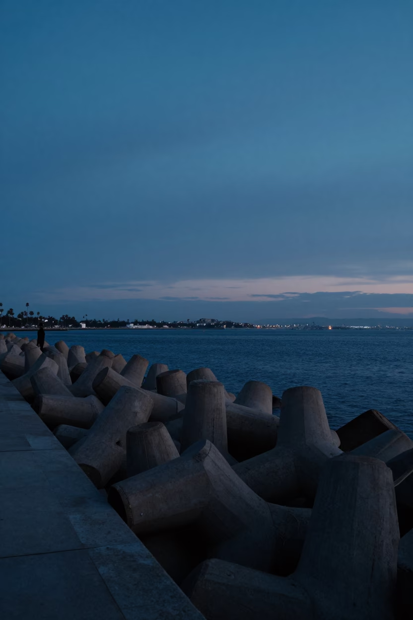 San Diego Harbor Breakwater at Indigo Twilight with Fading Blue Hour Sky in in San Diego, California, United States
