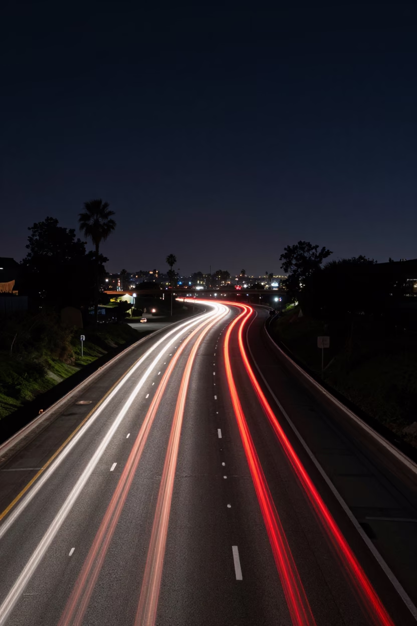 San Diego Night Highway Long Exposure Car Headlight Trails Under Deep Night Sky in in San Diego, California, United States