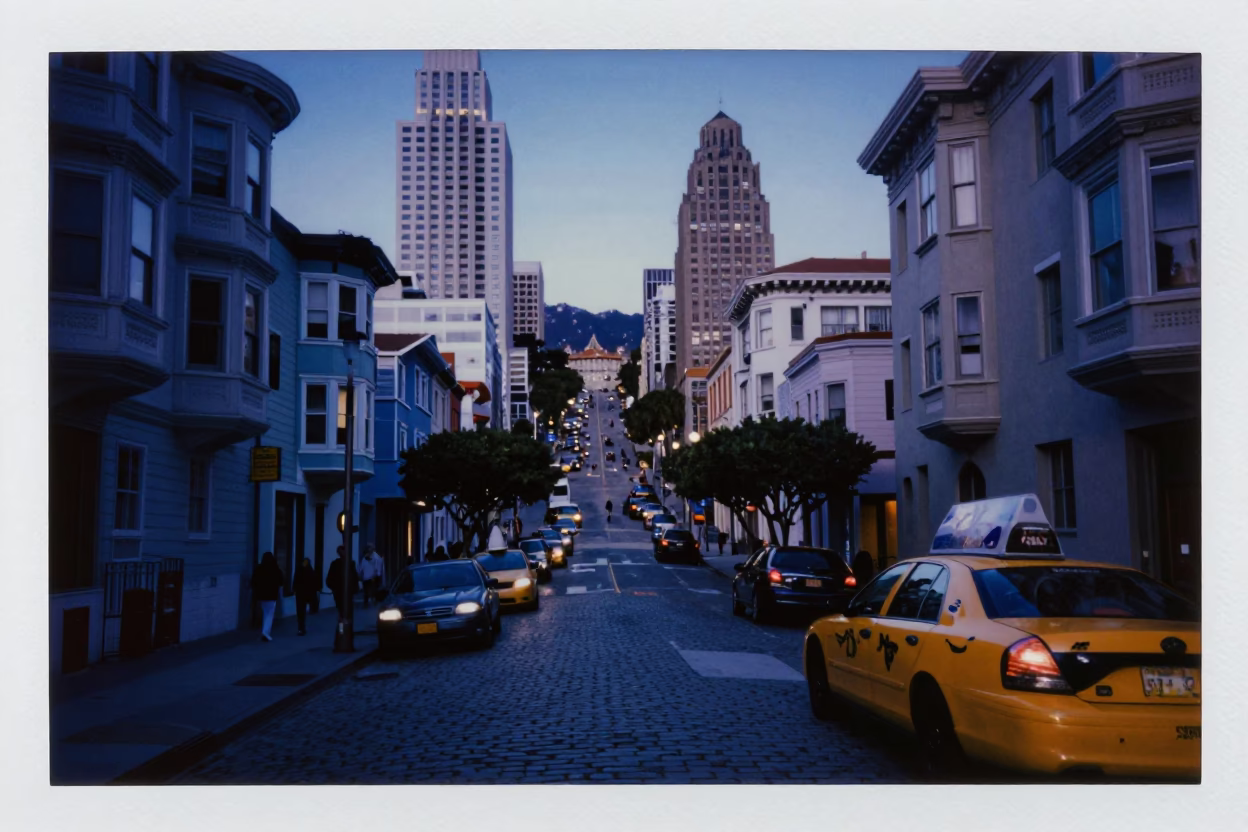 San Francisco Indigo Twilight Street Scene with Yellow Taxi and City Lights in in San Francisco, California, United States