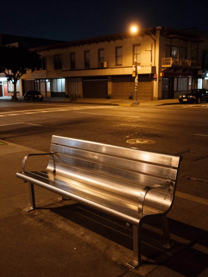 San Francisco Night Street Scene with Brushed Steel Bench and District Heating Pipes in in San Francisco, California, United States