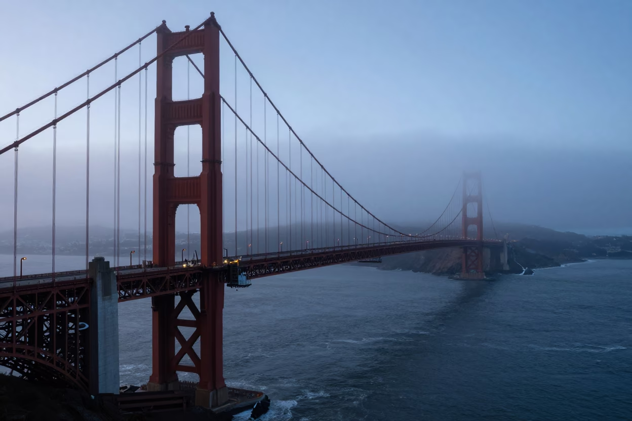 San Francisco Pre-Dawn Fog Rolling Over Golden Gate Bridge Maintenance Cage in in San Francisco, California, United States