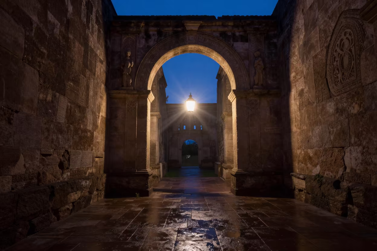 Silhouetted Sandstone Arch in Cali Abbey Cloister in inside a quiet cloister passage in Cali