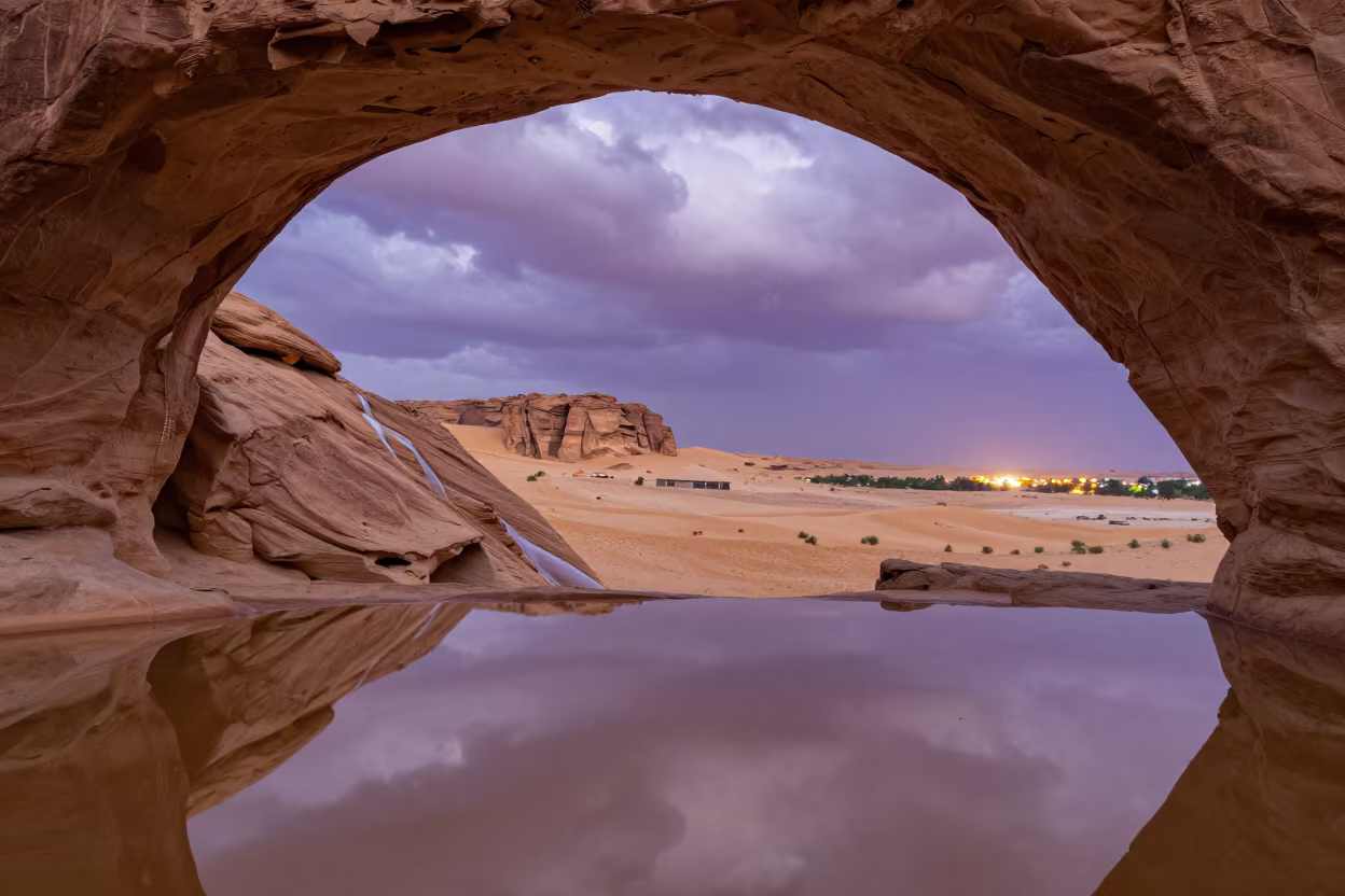 Sandstone Arch Over Flooded Desert Mesa in across a floodplain after rain near Abu Dhabi