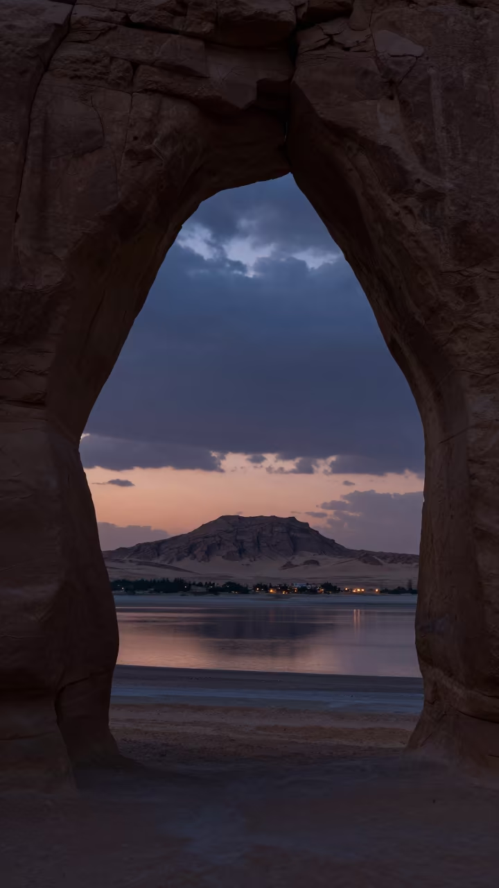 Sandstone Arch Over Indigo Desert Twilight in along a wave-cut shoreline near Riyadh