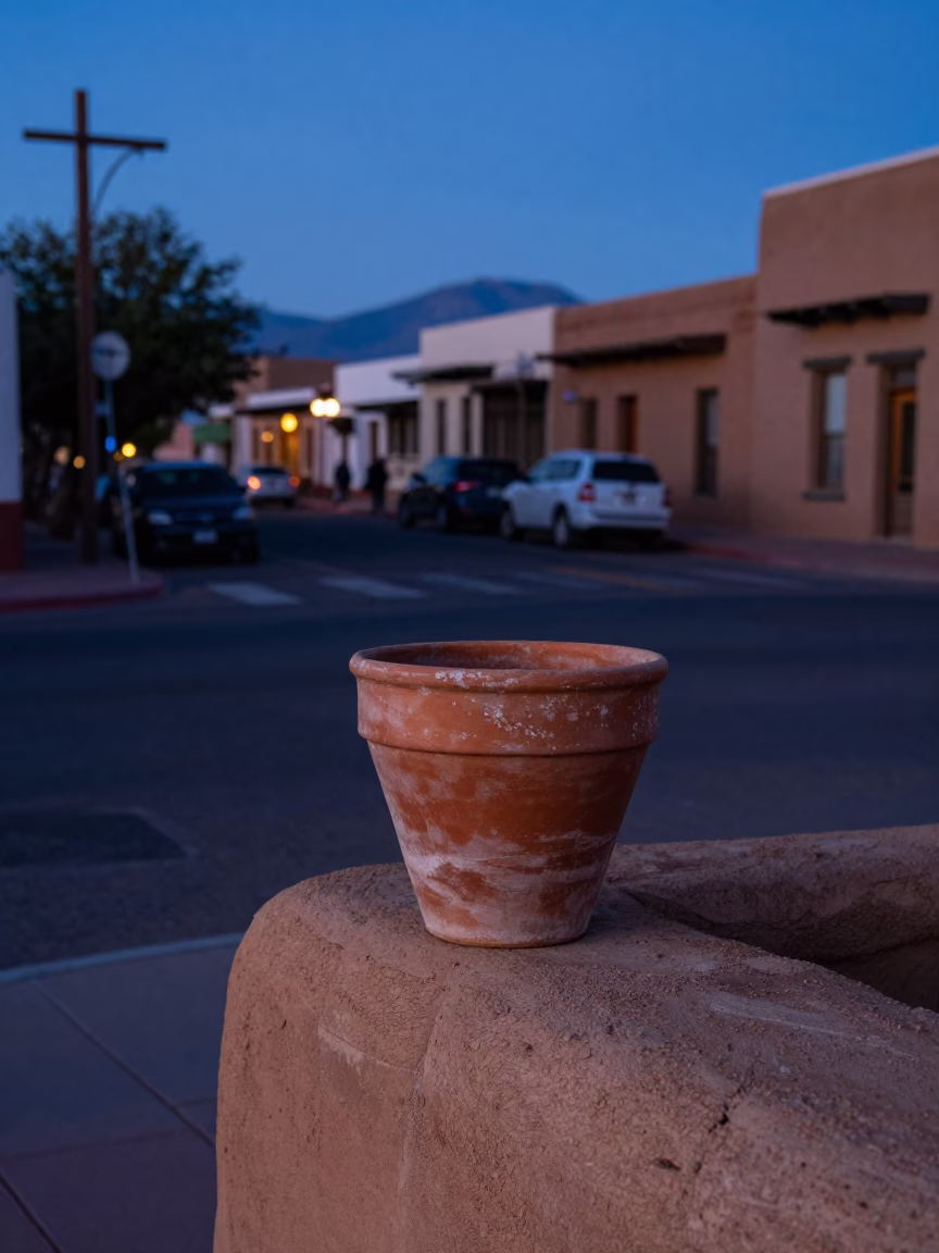 Santa Fe New Mexico indigo twilight street scene with terracotta pot and local architecture in in Santa Fe, New Mexico, United States