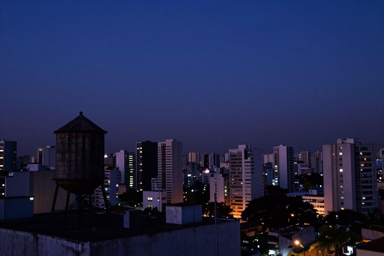 São Paulo Brazil Predawn Skyline View with Rooftop Water Tower and City Lights in in São Paulo, Brazil
