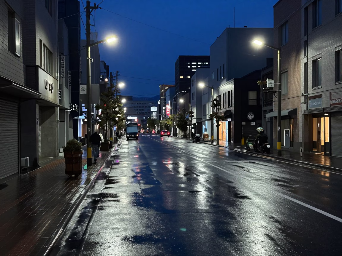 Sapporo Japan Predawn Street Scene with Neon Reflections and Urban Details in in Sapporo, Japan