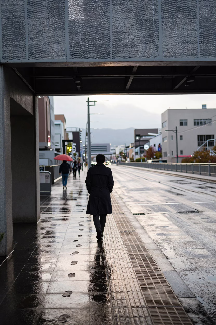 Sapporo Perforated Metal And Wet Footsteps Early Afternoon in in Sapporo, Japan