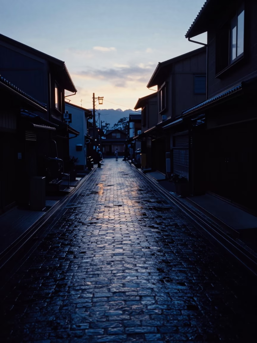 Sapporo Pre-Dawn Alleyway Reflections and Wet Cobblestone Surfaces in in Sapporo, Japan