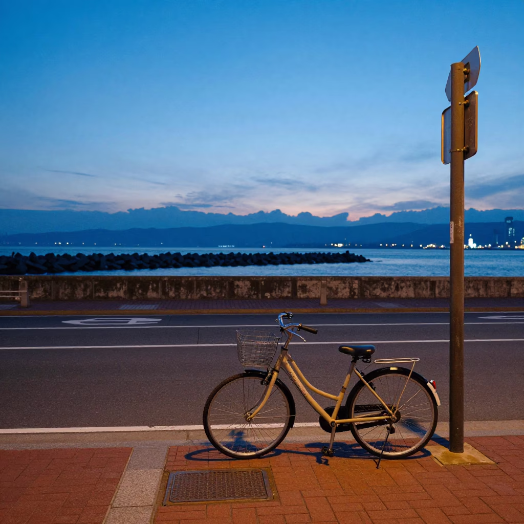 Sapporo street corner at nautical dawn with bicycle and blue hour sky in in Sapporo, Japan