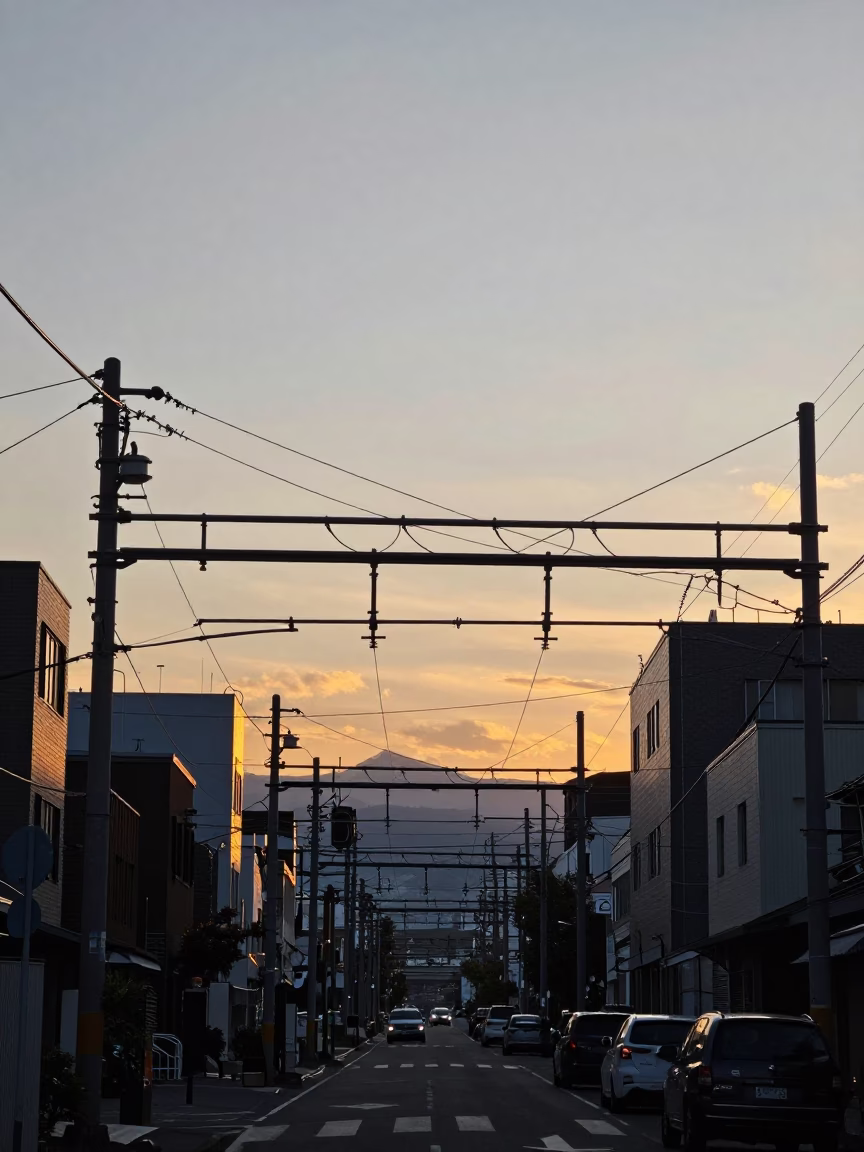Sapporo Sunset Street Scene with Catenary Wires and Urban Atmosphere in in Sapporo, Japan