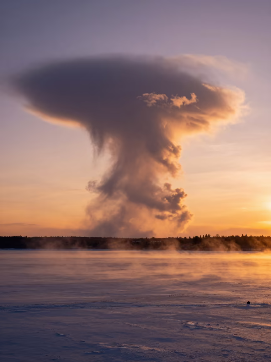 Saskatchewan Shelf Cloud Sunset Lake Silhouette in across a storm-bright plain in Saskatchewan