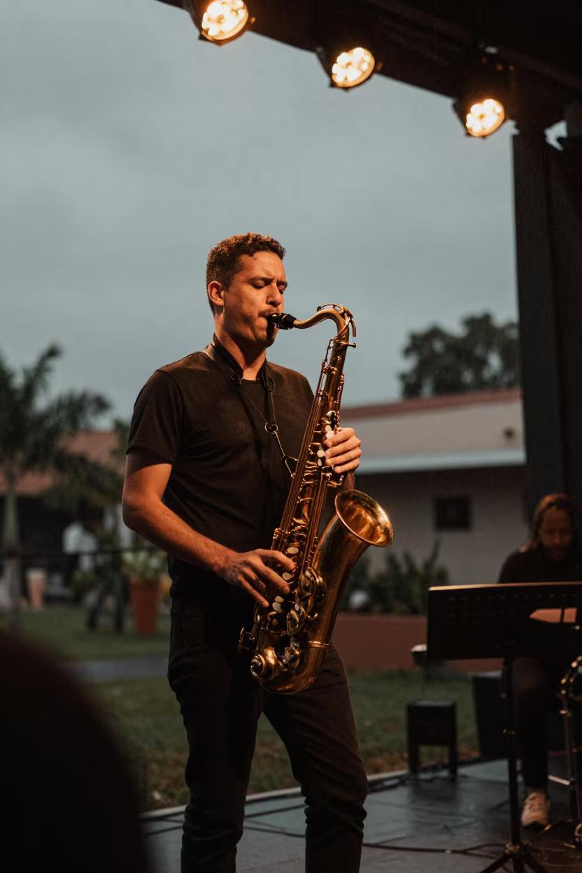 Saxophonist Solo Under Amber Stage Lights in on a dimly lit stage in Barinas