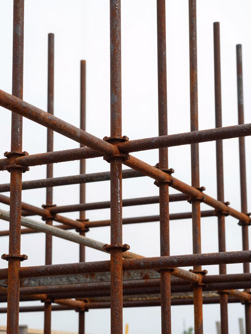 Scaffold Joints Against White Sky Richmond Hill in along a scaffolded facade in Richmond Hill