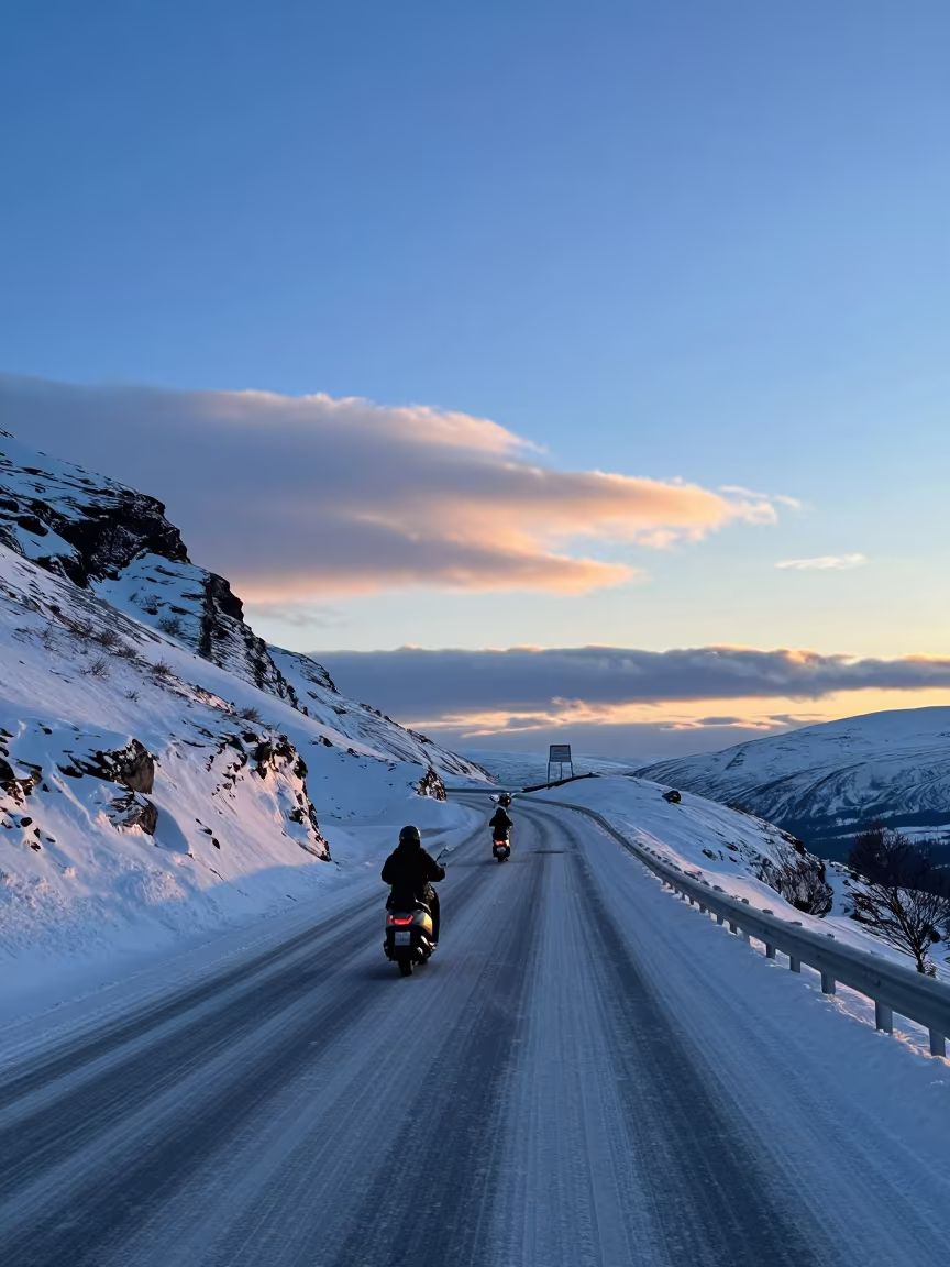 Scooter Convoy Alpine Saddle Midnight Sun Shadow in along a switchback approach near Rovaniemi