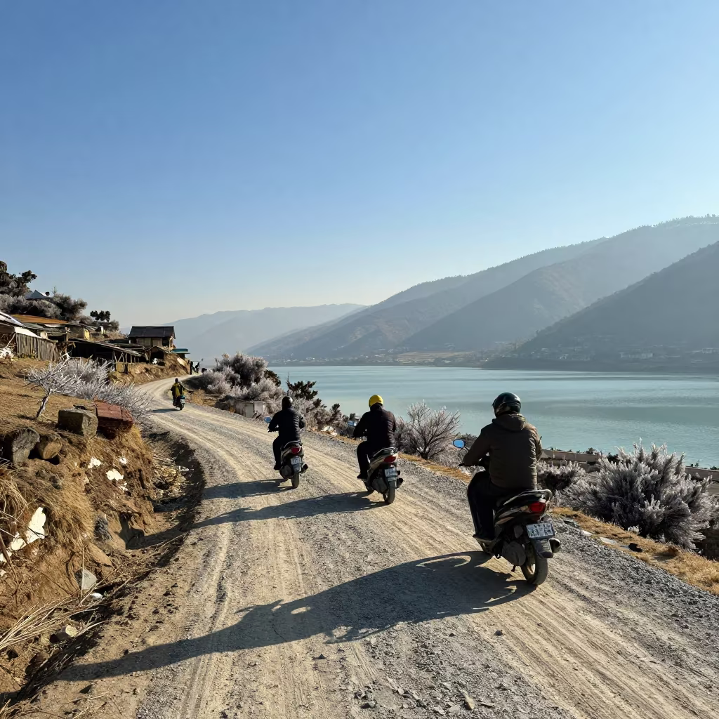 Scooter Convoy Alpine Saddle Winter Sun Shadows in along a switchback approach near Pokhara