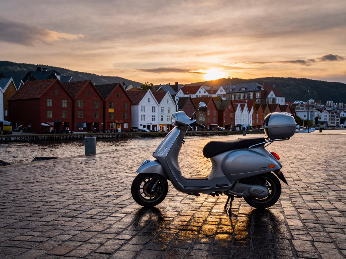 Scooter Parked on Bergen Harbor Promenade at Sunset with Bryggen Wharf Background in in Bergen, Norway