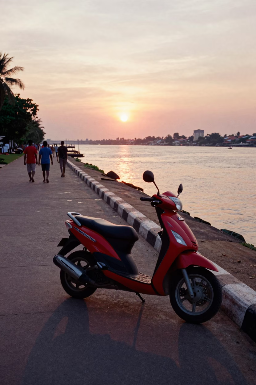 Scooter Parked on Phnom Penh Riverside Promenade at Sunset with Mekong River Views in in Phnom Penh, Cambodia