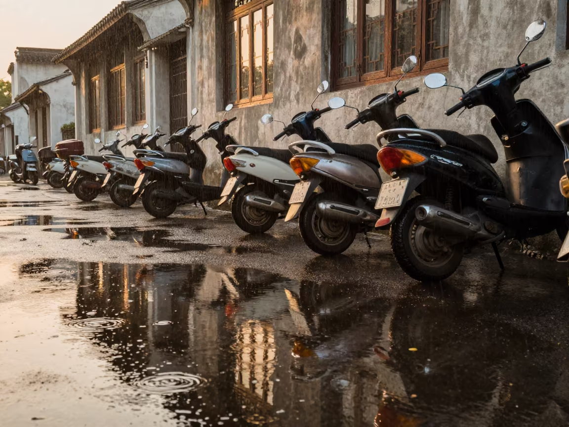 Scooter Reflections in Monsoon Dawn Puddle Suzhou in along a market-lined side street in Suzhou