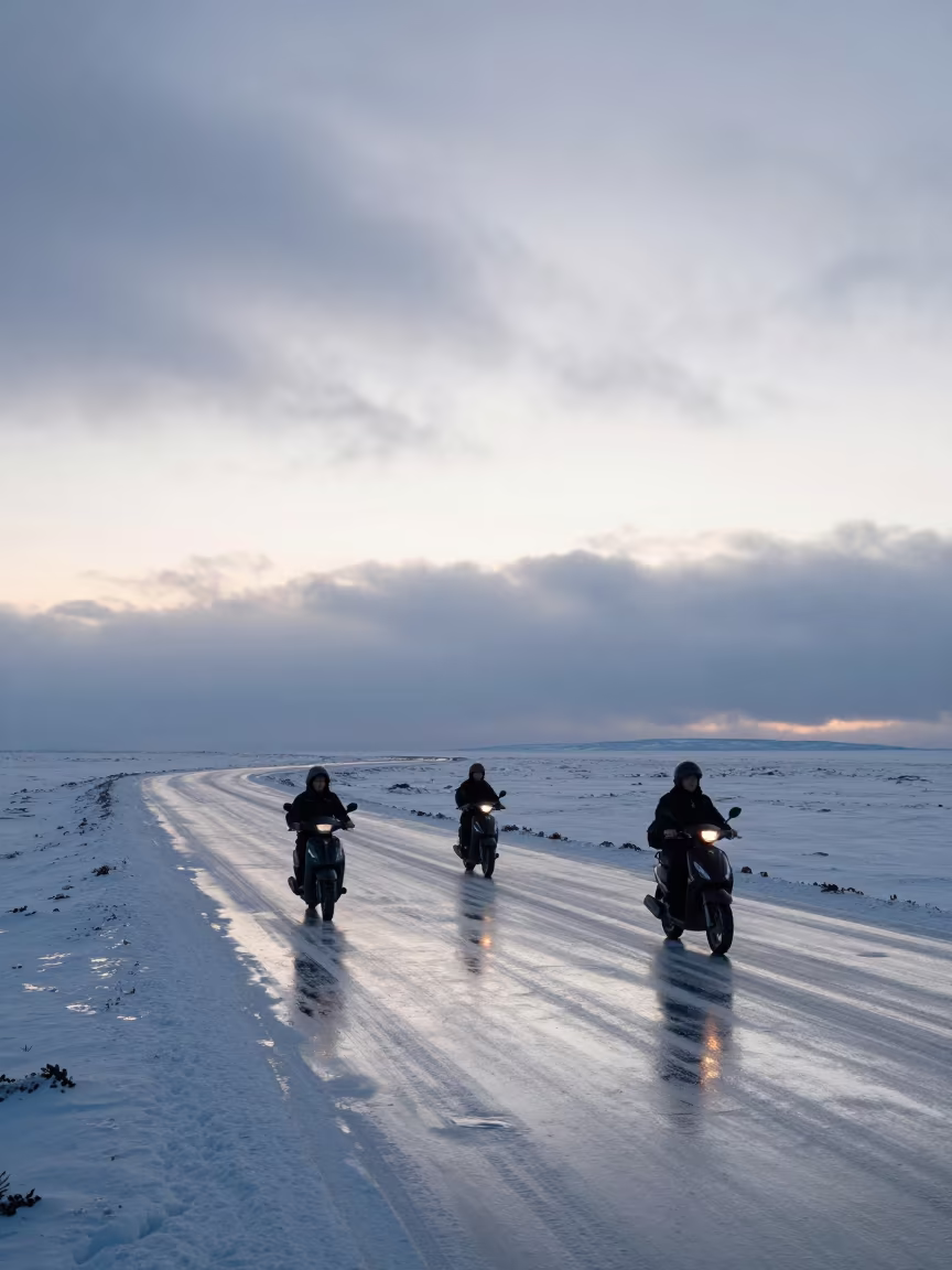 Scooters Cross Frozen Salt Flats at Dawn in along a switchback approach in Finland