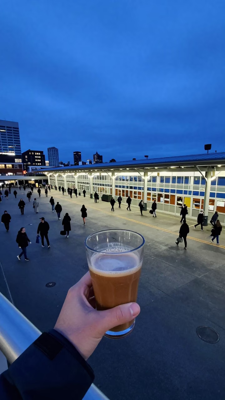 Seattle Evening Blue Hour Ferry Terminal Commuters with Coffee and City Skyline in in Seattle, Washington, United States