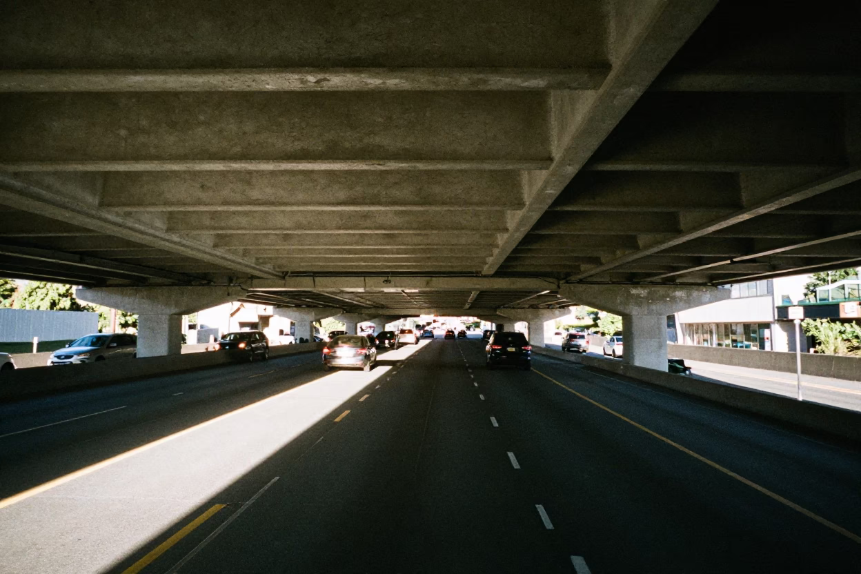 Seattle Highway Overpass Underside with Traffic Shadows at Noon in in Seattle, Washington, United States