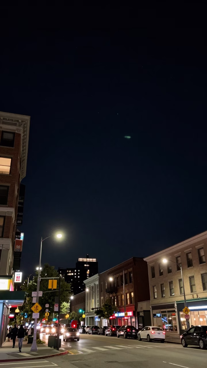 Seattle Night Sky Above Urban Street Life with Neon Reflections and City Lights in in Seattle, Washington, United States
