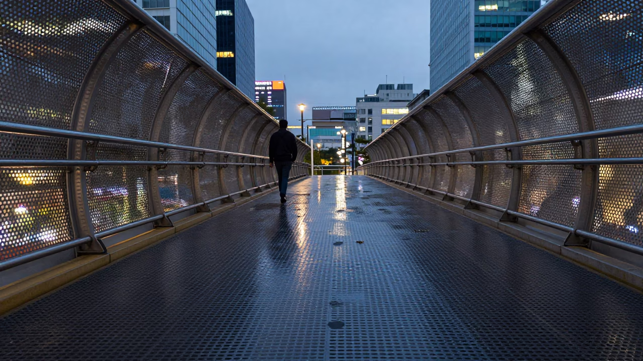 Seoul South Korea Evening Pedestrian Overpass Wet Footsteps Perforated Metal City Lights in in Seoul, South Korea