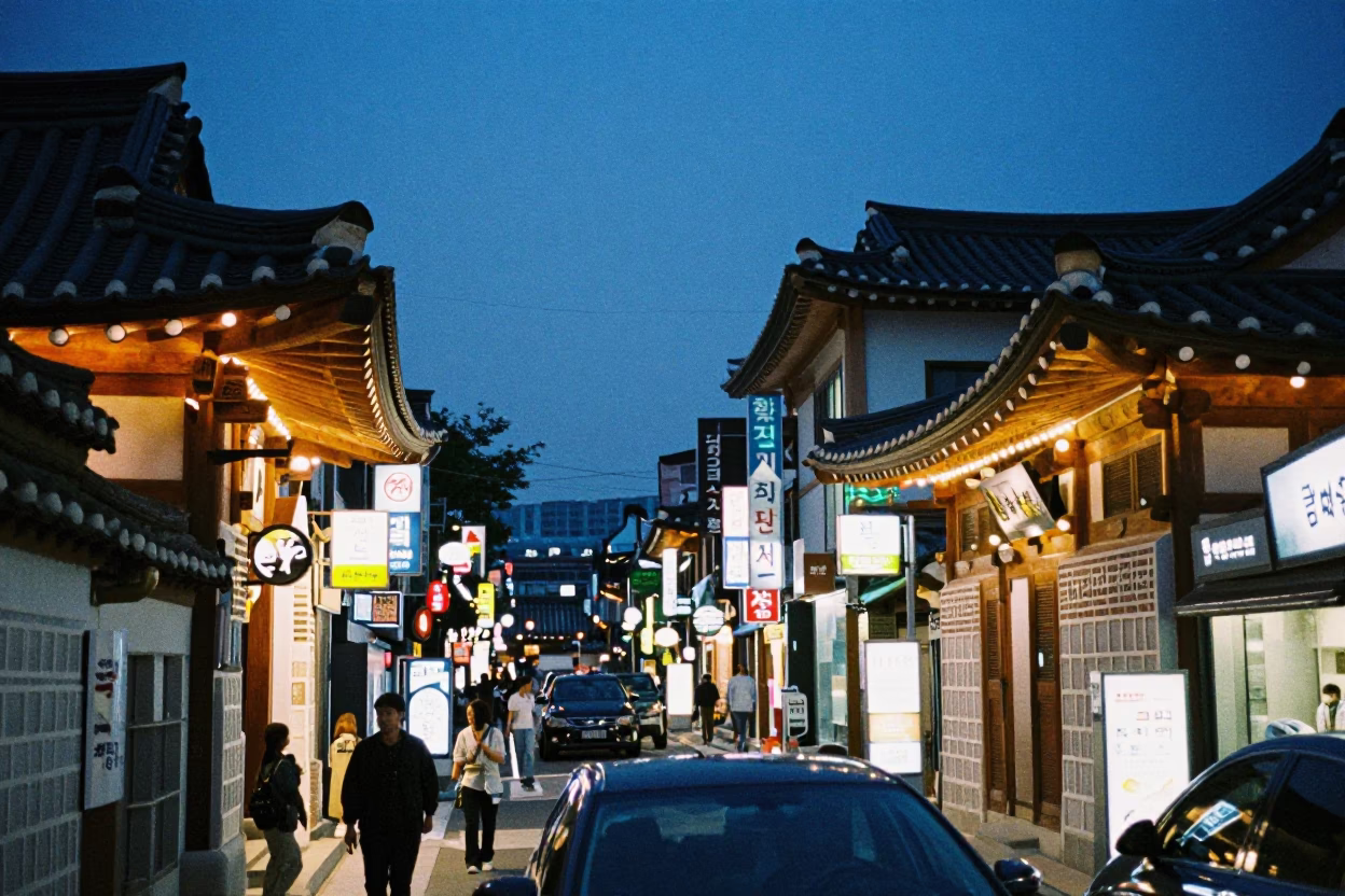 Seoul street scene at blue hour with neon signs and traditional architecture in in Seoul, South Korea