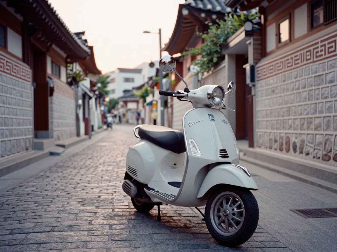 Seoul street scene just after sunrise with vintage Vespa on cobblestone lane in in Seoul, South Korea